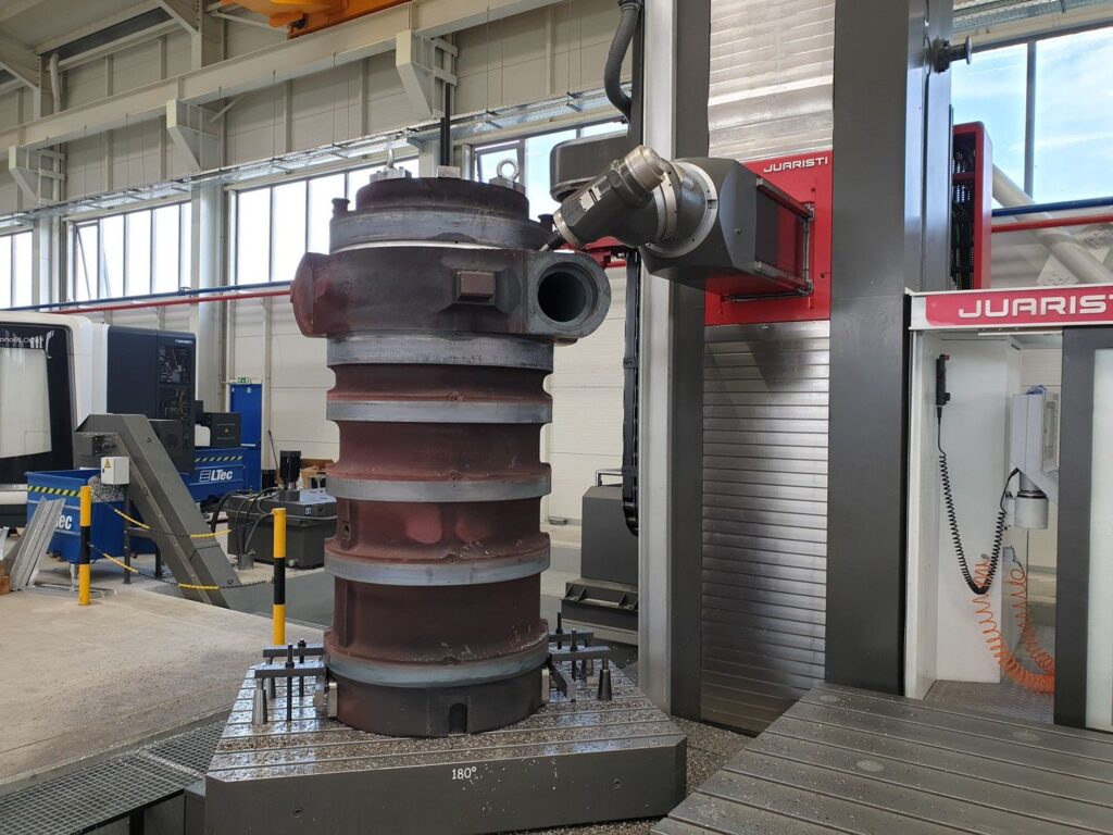 The casing was assembled and positioned vertically for machining and removal of the circumferential crack found